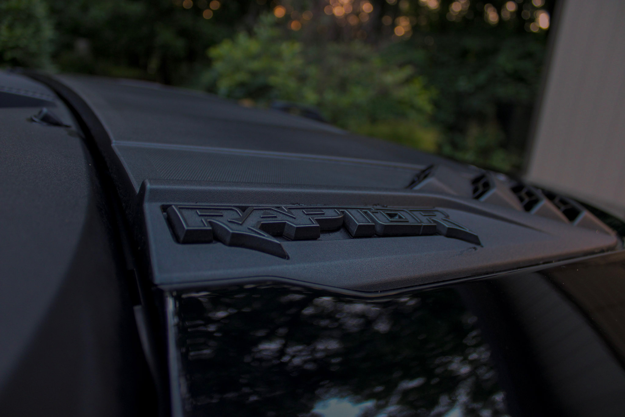 Ford Bronco Raptor - Raptor hood badge close-up