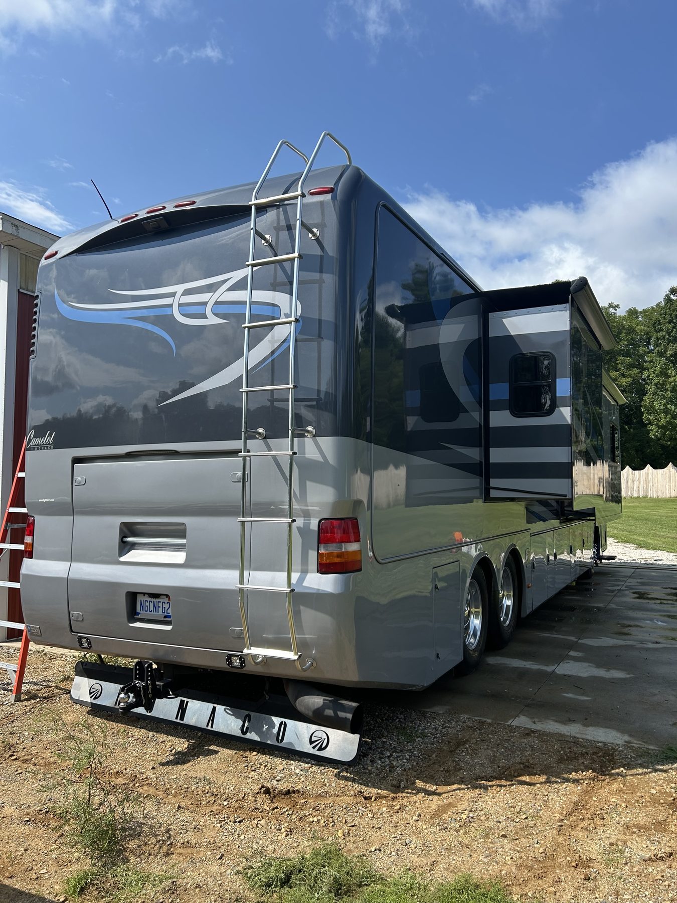 Monaco Camelot Class A motorhome - Rear three-quarter view with restored shine